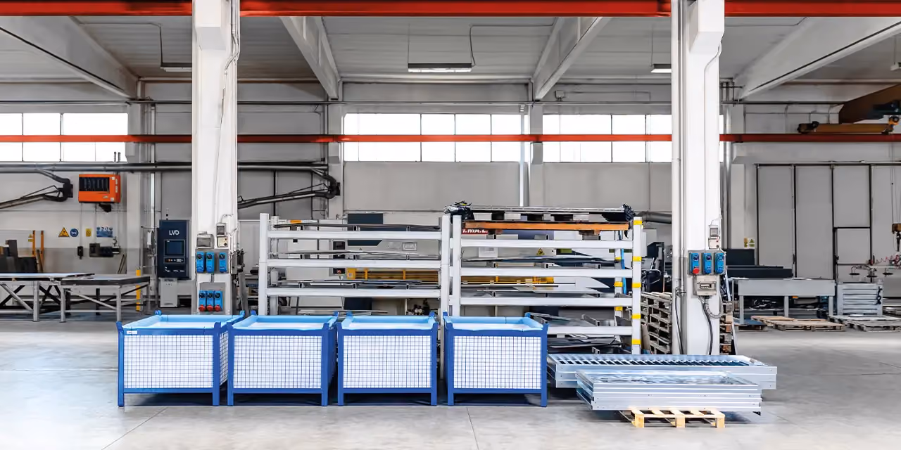 Modularte's production site: large workshop spaces given over to precision metalwork for luxury outdoor furniture.
